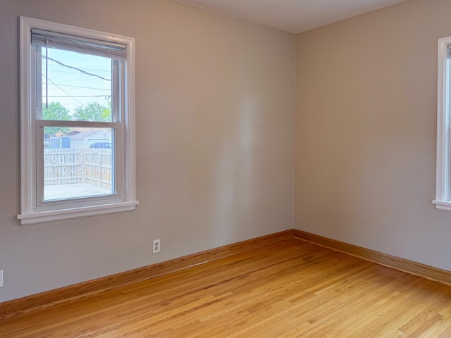 1759 Arlington Ave E, Saint Paul, MN 55106 - spare room featuring light wood finished floors and baseboards