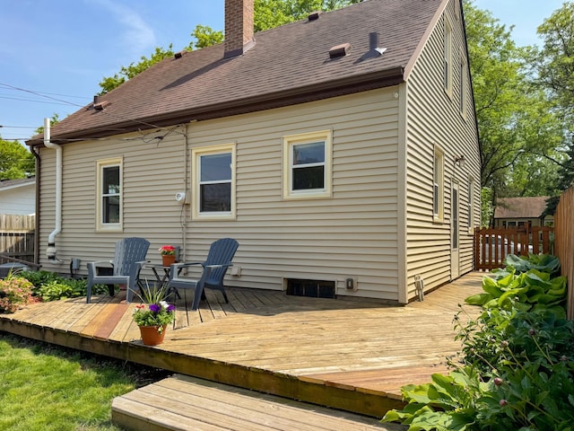1759 Arlington Ave E, Saint Paul, MN 55106 - back of property featuring a chimney, a shingled roof, and a wooden deck