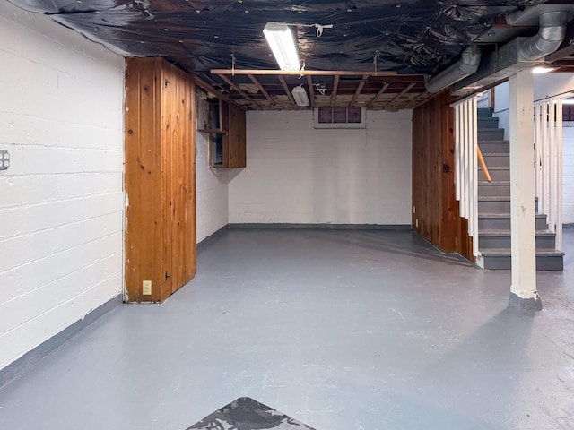 1759 Arlington Ave E, Saint Paul, MN 55106 - unfinished basement with stairs and concrete block wall