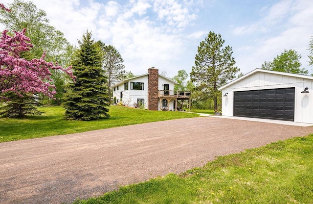 315 Pleasant View Rd, Duluth, MN 55803 - view of front of house featuring a front yard, a chimney, and a wooden deck