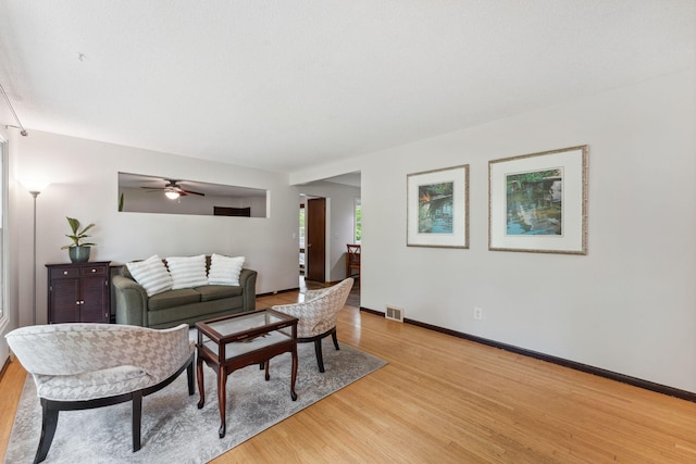 8400 Virginia Cir S, Saint Louis Park, MN 55426 - living area with light wood-style floors, ceiling fan, and baseboards