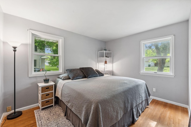 8400 Virginia Cir S, Saint Louis Park, MN 55426 - bedroom with baseboards and light wood-type flooring