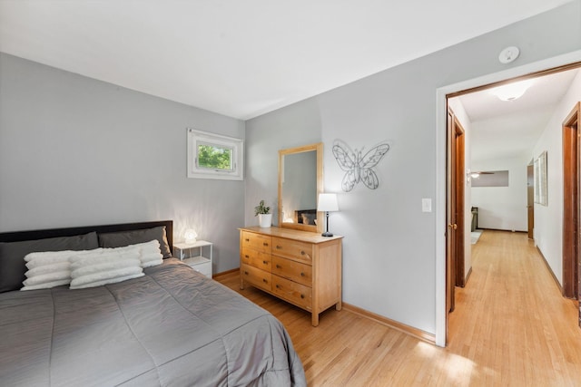 8400 Virginia Cir S, Saint Louis Park, MN 55426 - bedroom with light wood-style floors and baseboards