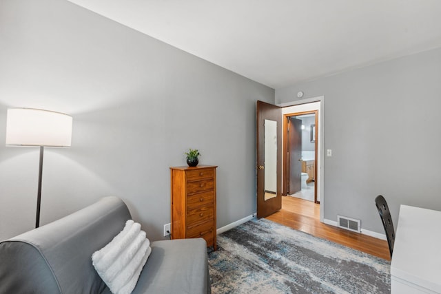 8400 Virginia Cir S, Saint Louis Park, MN 55426 - sitting room featuring wood finished floors, baseboards, and an office area