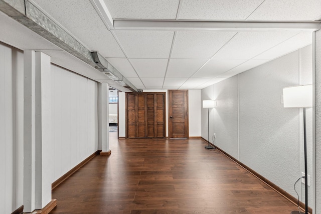 8400 Virginia Cir S, Saint Louis Park, MN 55426 - unfurnished room with wood finished floors, a textured wall, a drop ceiling, and baseboards