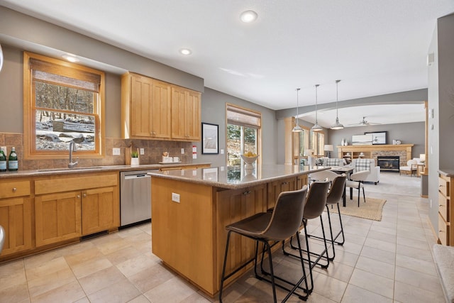 1496 Pinetree Trl, Eagan, MN 55122 - kitchen with dishwasher, a sink, a kitchen island, open floor plan, and backsplash