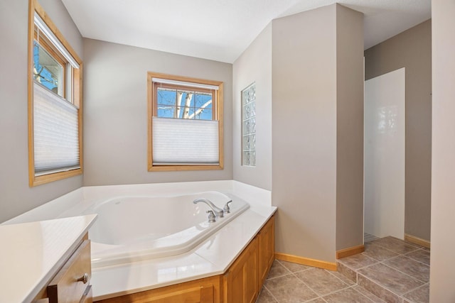 1496 Pinetree Trl, Eagan, MN 55122 - bathroom featuring a bath and baseboards