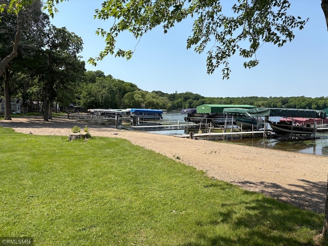 10255 Nevens Ave NW Unit 50, South Haven, MN 55382 - dock area with a yard, a water view, and boat lift