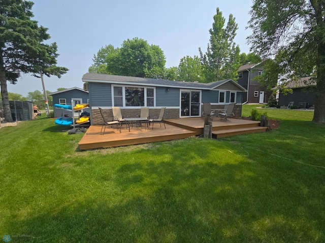 14768 Tradewinds Rd, Lake Eunice Twp, MN 56511 - rear view of property featuring a lawn, stone siding, and a wooden deck