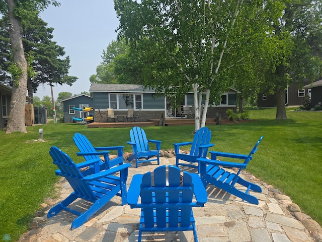 14768 Tradewinds Rd, Lake Eunice Twp, MN 56511 - view of patio / terrace featuring an outdoor fire pit
