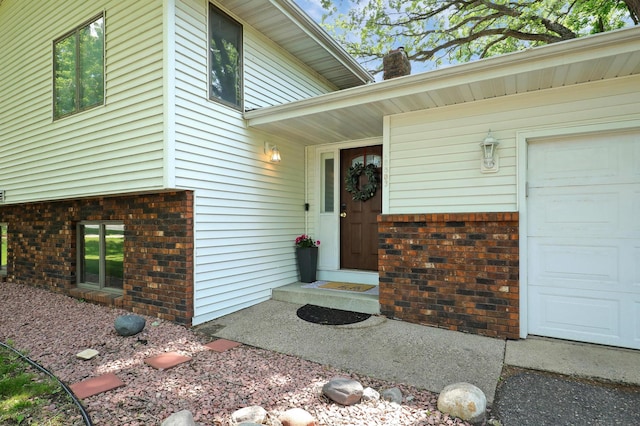 16503 Franklin Trl SE, Prior Lake, MN 55372 - property entrance with brick siding and a chimney
