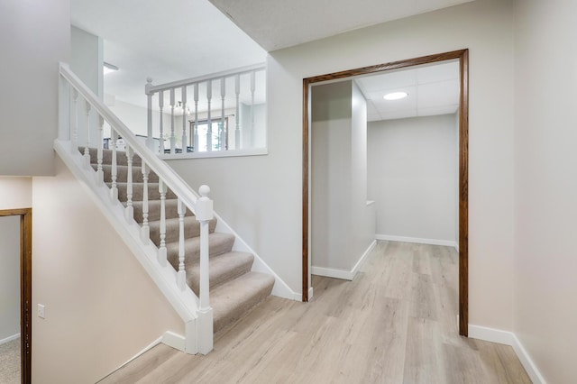 16503 Franklin Trl SE, Prior Lake, MN 55372 - stairs featuring wood finished floors and baseboards