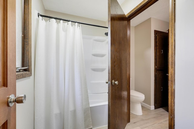 16503 Franklin Trl SE, Prior Lake, MN 55372 - full bath featuring toilet, wood finished floors, and shower / tub combo