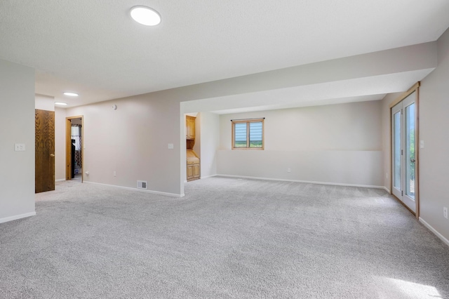 16503 Franklin Trl SE, Prior Lake, MN 55372 - spare room with light colored carpet, stairs, and baseboards