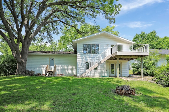 16503 Franklin Trl SE, Prior Lake, MN 55372 - back of property featuring entry steps, a wooden deck, and a lawn