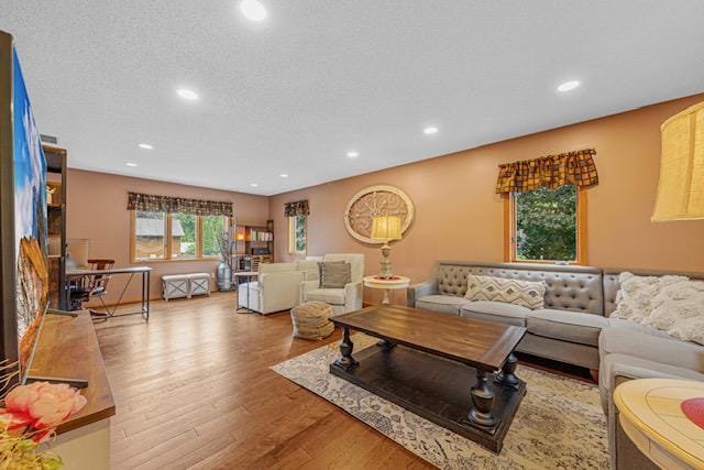 1525 21st Ave NW, Faribault, MN 55021 - living area with wood finished floors and recessed lighting