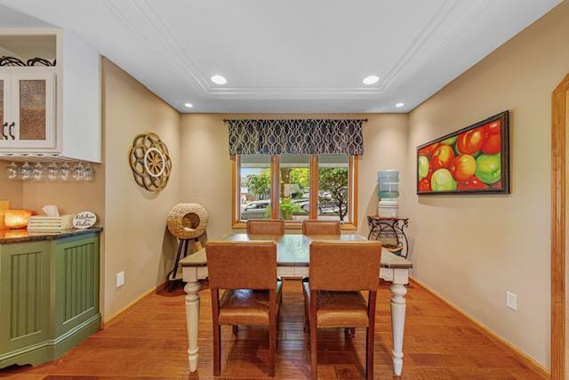 1525 21st Ave NW, Faribault, MN 55021 - dining room with wood finished floors, recessed lighting, baseboards, and a tray ceiling