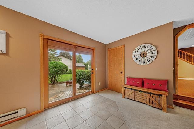 1525 21st Ave NW, Faribault, MN 55021 - doorway with baseboard heating and baseboards