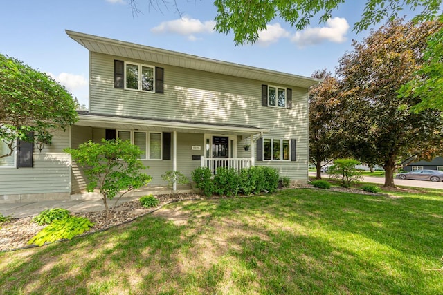 1525 21st Ave NW, Faribault, MN 55021 - traditional home featuring covered porch and a front yard