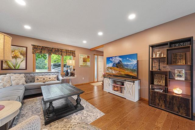 1525 21st Ave NW, Faribault, MN 55021 - living area with wood finished floors and recessed lighting