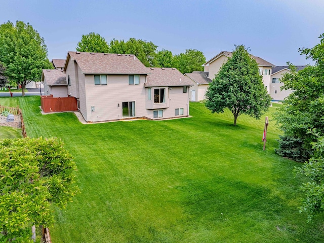 1918 Silver St, Waconia, MN 55387 - rear view of property featuring a lawn