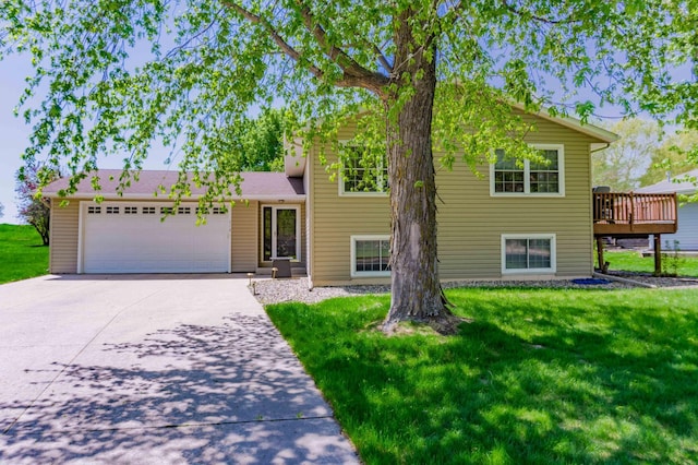 319 Casper Cir, Norwood Young America, MN 55368 - split level home with concrete driveway, a garage, a front yard, and a deck