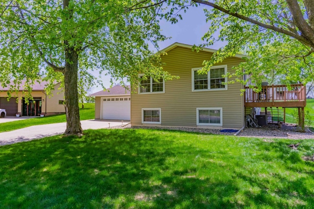 319 Casper Cir, Norwood Young America, MN 55368 - view of front facade featuring a front lawn, cooling unit, a garage, a deck, and driveway