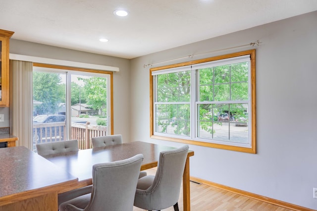 319 Casper Cir, Norwood Young America, MN 55368 - dining area with light wood-style floors, baseboards, and recessed lighting