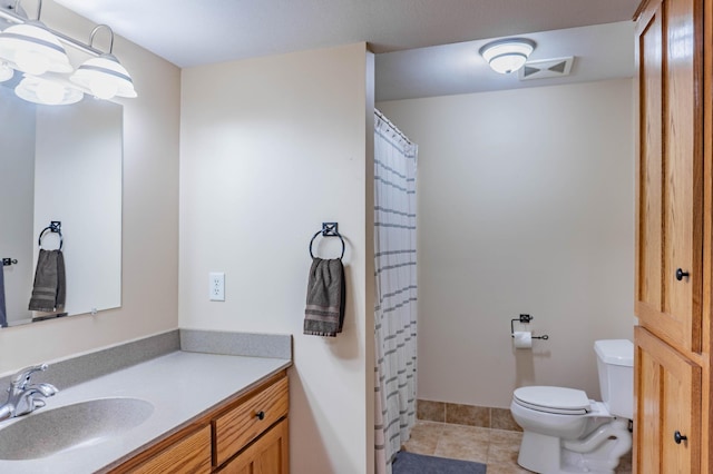 319 Casper Cir, Norwood Young America, MN 55368 - bathroom with toilet, vanity, tile patterned flooring, and curtained shower