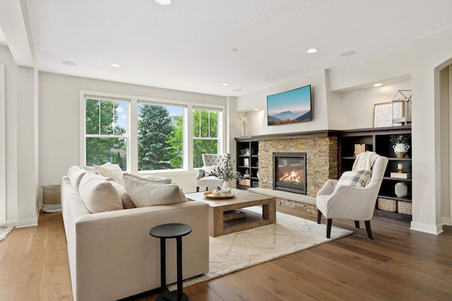 16632 Early Dawn Trl, Lakeville, MN 55044 - living room with a fireplace, wood finished floors, recessed lighting, and baseboards