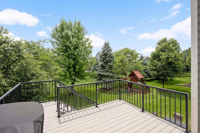 16632 Early Dawn Trl, Lakeville, MN 55044 - wooden deck featuring a playground and a yard