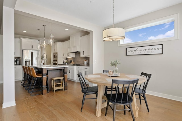 16632 Early Dawn Trl, Lakeville, MN 55044 - dining space featuring light wood-style flooring, recessed lighting, and baseboards
