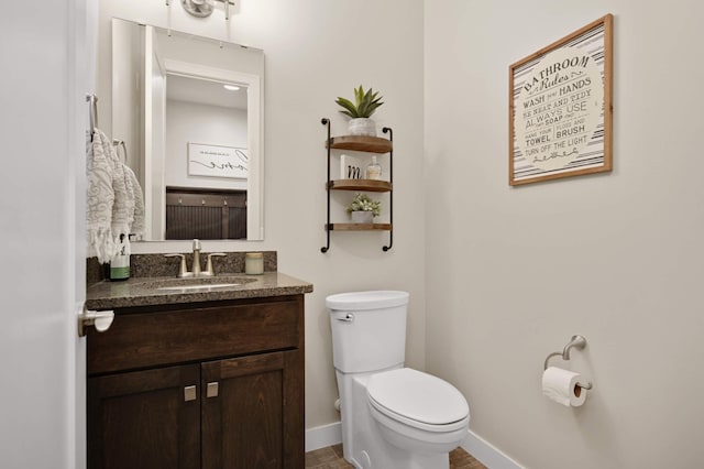 16632 Early Dawn Trl, Lakeville, MN 55044 - half bath featuring toilet, vanity, and baseboards