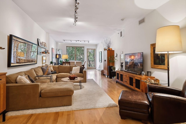 401 2nd St Unit 208, Minneapolis, MN 55401 - living area featuring track lighting and wood finished floors