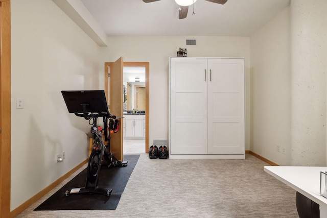 401 2nd St Unit 208, Minneapolis, MN 55401 - exercise room featuring a ceiling fan, carpet flooring, and baseboards