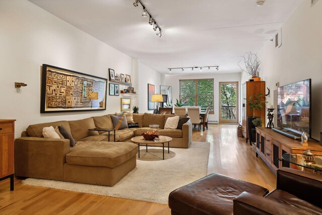401 2nd St Unit 208, Minneapolis, MN 55401 - living area with rail lighting and wood finished floors