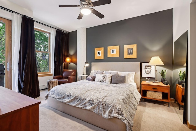 401 2nd St Unit 208, Minneapolis, MN 55401 - carpeted bedroom featuring baseboard heating and a ceiling fan