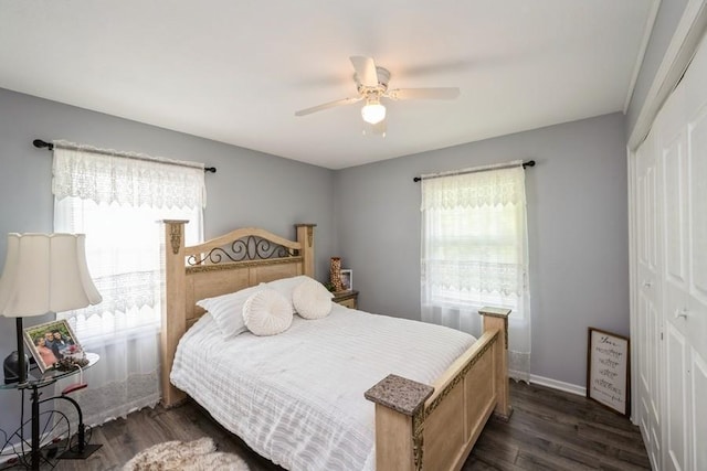 2575 Quebec Ave S, Saint Louis Park, MN 55426 - bedroom with multiple windows, a closet, dark wood-type flooring, and ceiling fan