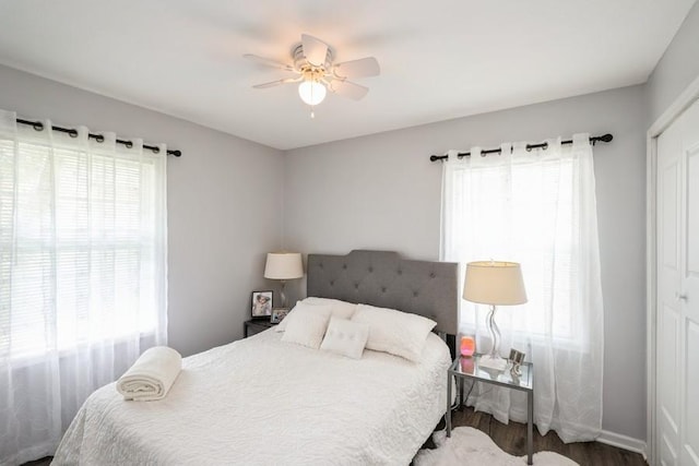 2575 Quebec Ave S, Saint Louis Park, MN 55426 - bedroom featuring wood finished floors, ceiling fan, a closet, and baseboards