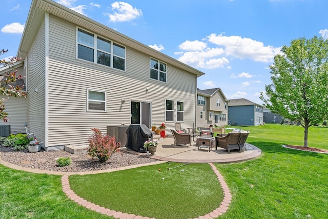 14143 Ailesbury Ave, Rosemount, MN 55068 - rear view of property featuring an outdoor living space, a patio area, and a yard