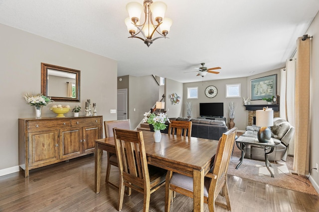 14143 Ailesbury Ave, Rosemount, MN 55068 - dining space with a ceiling fan, wood finished floors, stairway, and a chandelier