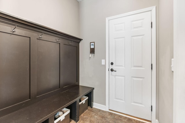 14143 Ailesbury Ave, Rosemount, MN 55068 - mudroom featuring baseboards