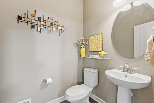 14143 Ailesbury Ave, Rosemount, MN 55068 - half bathroom with toilet and baseboards