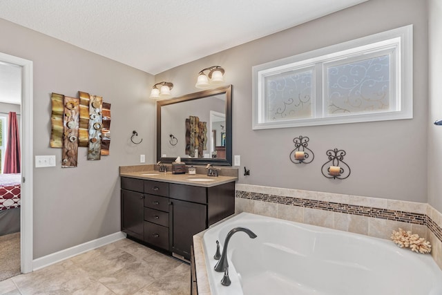 14143 Ailesbury Ave, Rosemount, MN 55068 - ensuite bathroom featuring double vanity, a bath, and tile patterned floors