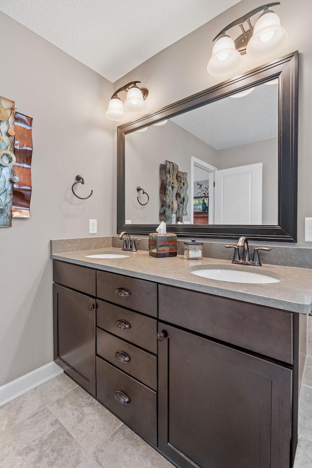 14143 Ailesbury Ave, Rosemount, MN 55068 - full bathroom with double vanity and baseboards