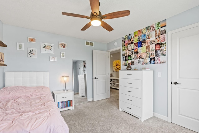 14143 Ailesbury Ave, Rosemount, MN 55068 - bedroom featuring light carpet and a ceiling fan