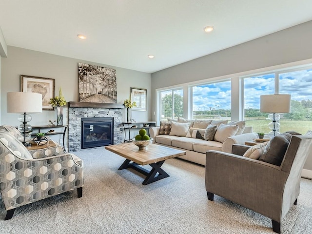 68 143rd Ave NW, Andover, MN 55304 - carpeted living room with a stone fireplace and recessed lighting