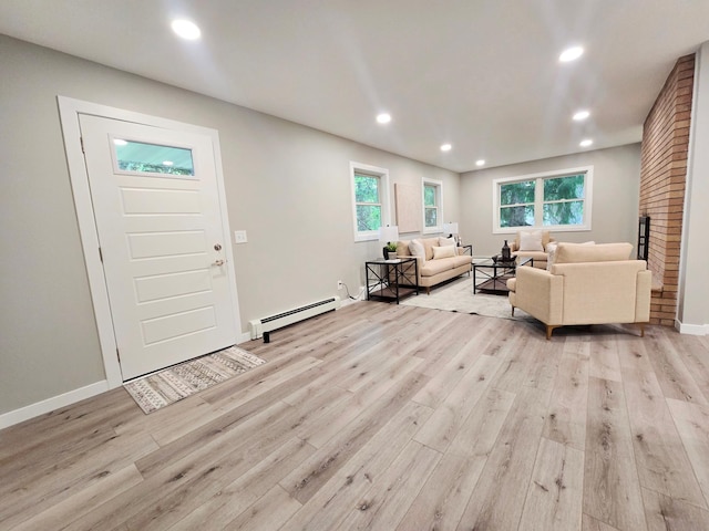 2710 Garden Ln, Mound, MN 55364 - foyer entrance with a baseboard heating unit, light wood-type flooring, and recessed lighting