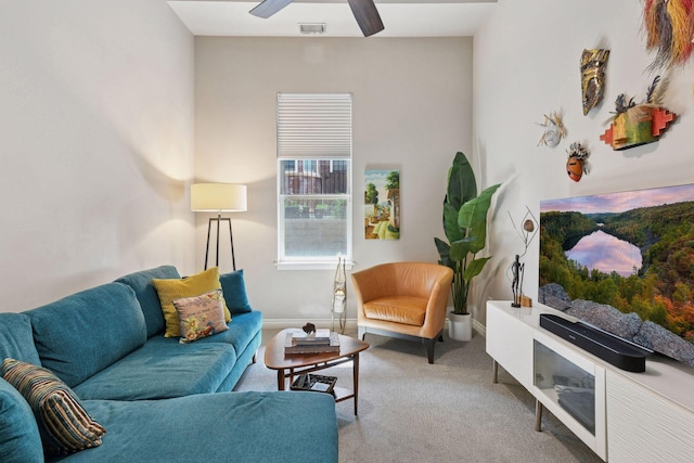 301 Clifton Ave Unit 1K, Minneapolis, MN 55403 - carpeted living area featuring ceiling fan and baseboards