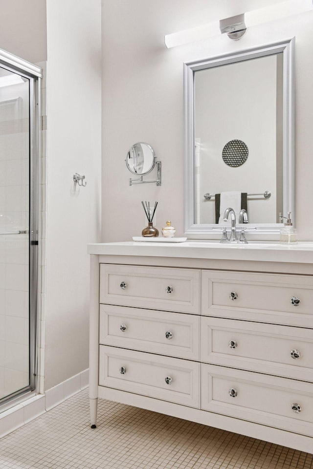 301 Clifton Ave Unit 1K, Minneapolis, MN 55403 - bathroom featuring a shower stall and vanity